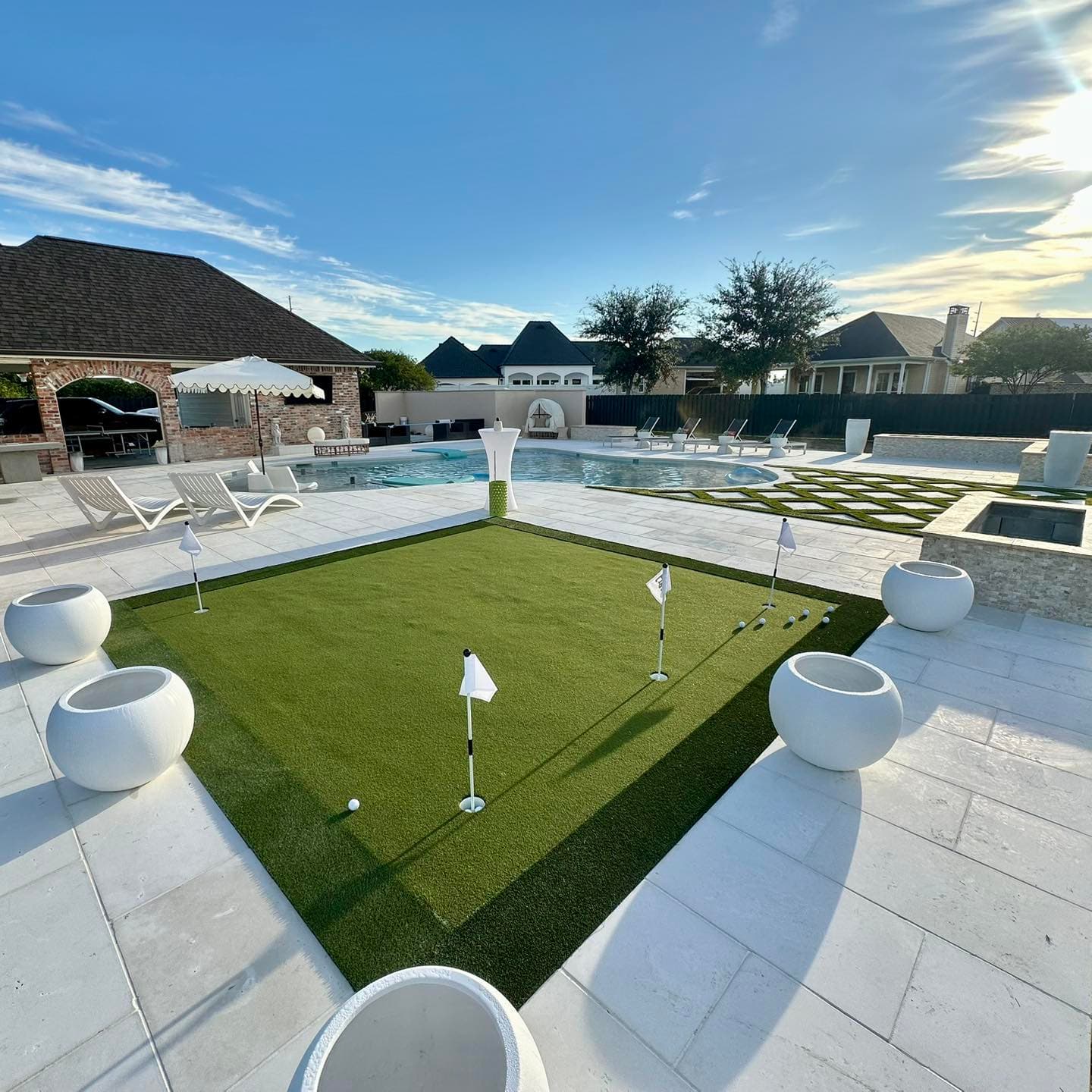 Outdoor living with putting green and pool